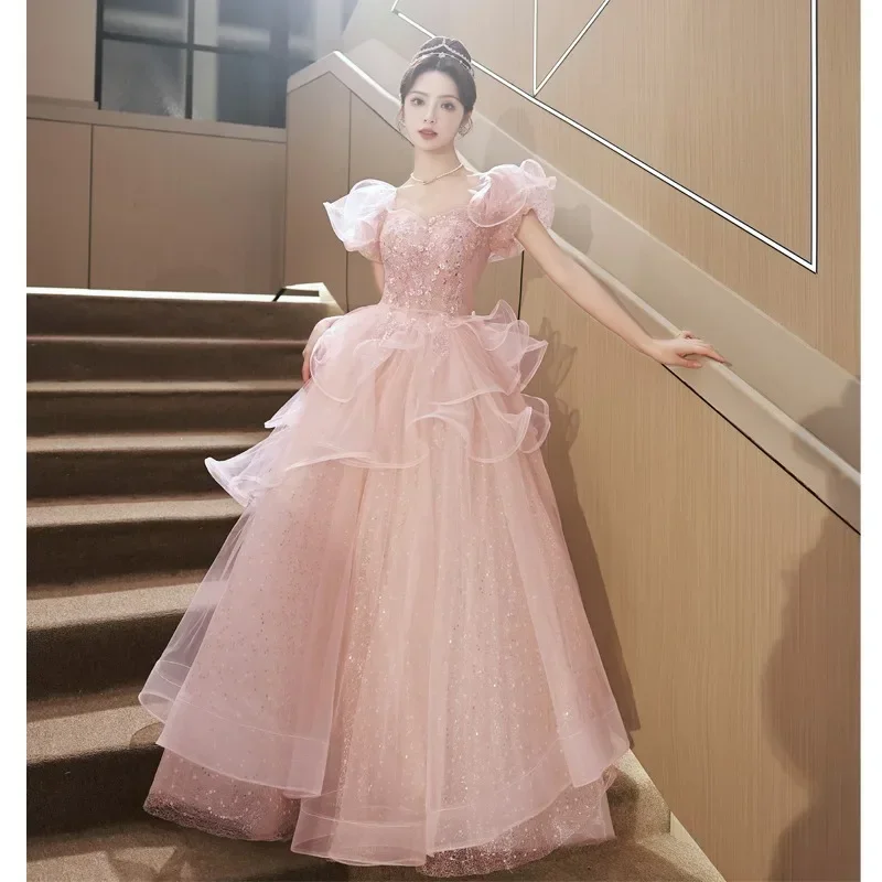 Dance the night away in our 2023 new arrival pink prom dress with beautiful ruffles lace appliques