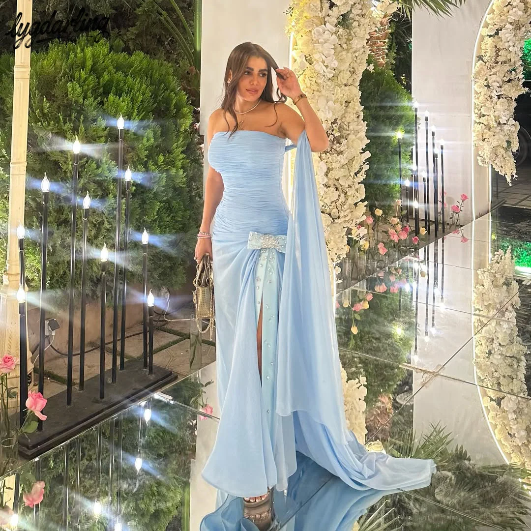 light blue designer dress Baby Serenade Gown Teuta Matoshi while the sleeveless design adds a modern and graceful touch 7481