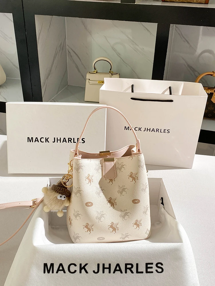 

Popular and Luxury Bucket Bag with Charming Embroidery and Pendant Women's Stylish and Versatile Handheld Crossbody Bag