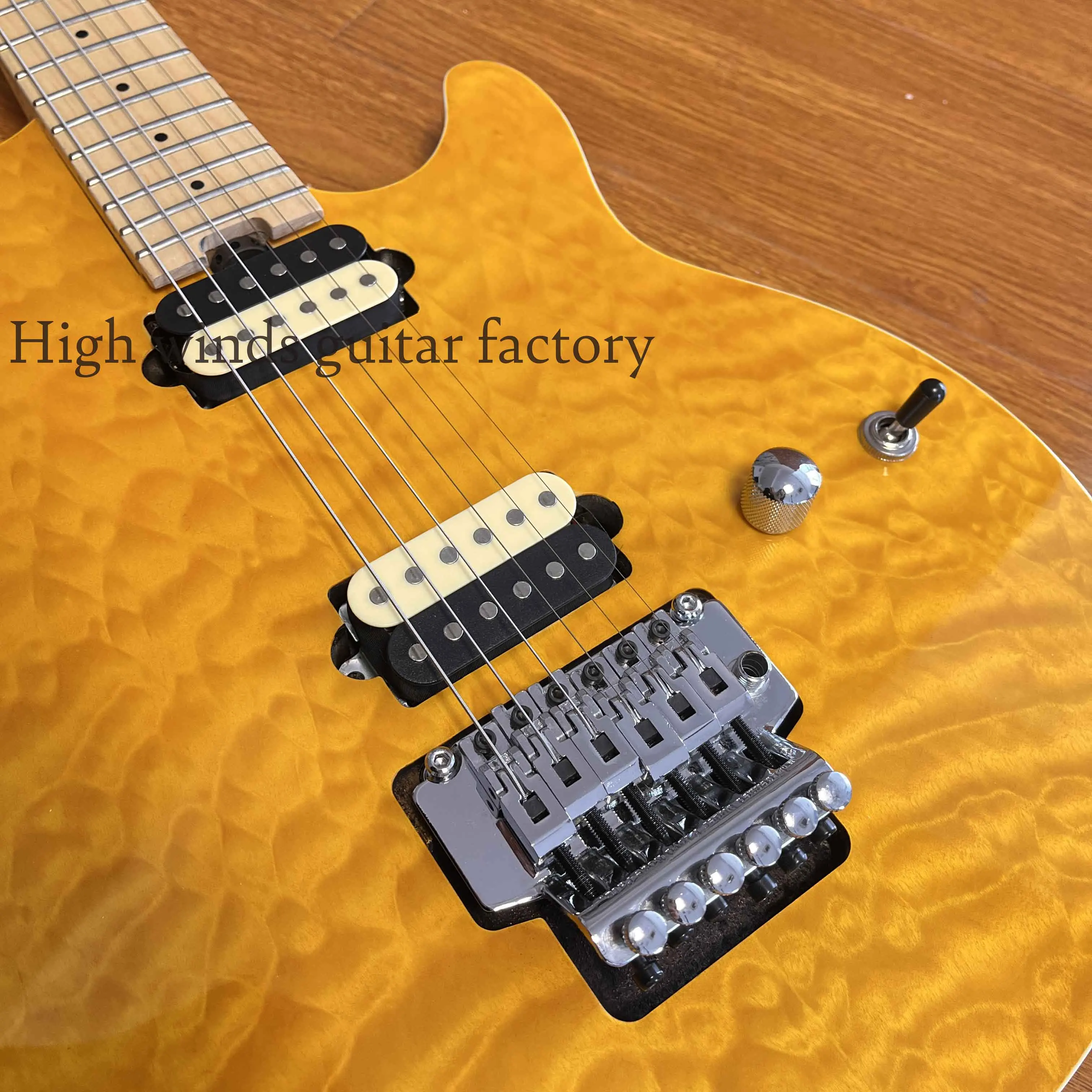 The electric guitar has a two-color pickup with a maple mahogany body and a maple neck