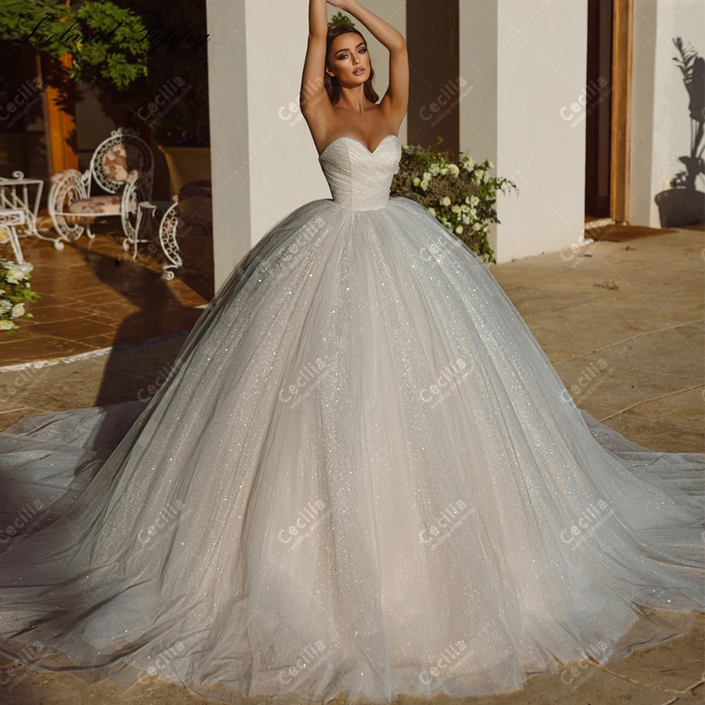 

Gorgeous Wedding Dresses A-Line Tulle Tiered Bridal Gowns Floor Length Robes Strapless Backless Princess Vestidos De Novia 2024