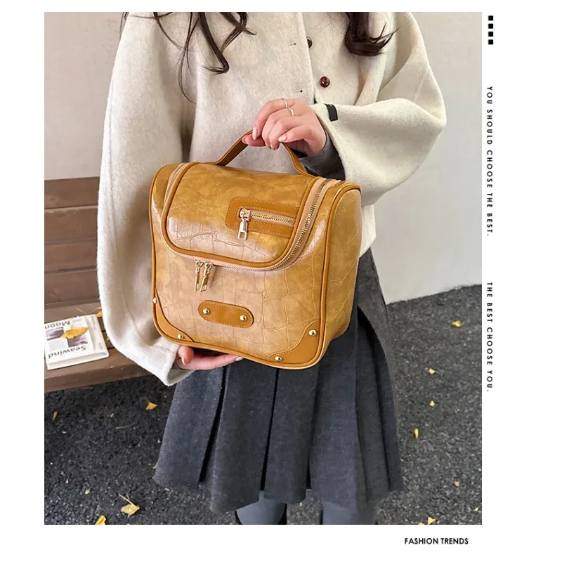 2026 Cross border Leather Handheld Makeup Bag, Travel Hook Toilet Bag, Large Capacity Cosmetics Storage Bag