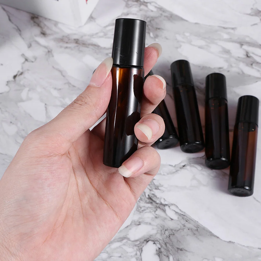 12 ชิ้น 5 มล. ขวดโรลออนน้ำมันหอมระเหยบรรจุภัณฑ์ย่อยแก้วทนทานป้องกันการรั่วซึมรีฟิลได้ขวดโรลออนสีน้ำตาล