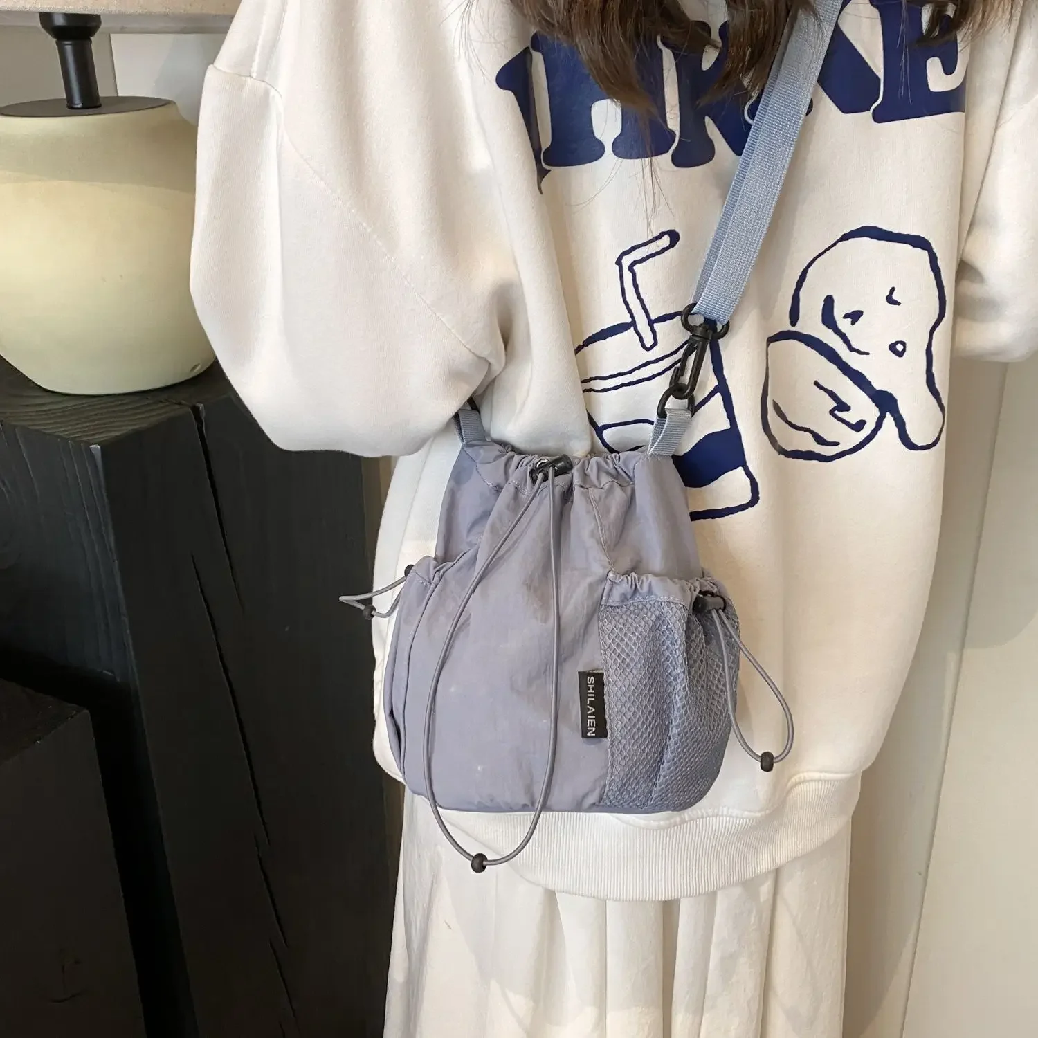 Niche Design Nylon Drawstring Outdoor Sports and Leisure Commuting One Shoulder Crossbody Versatile Bucket Bag