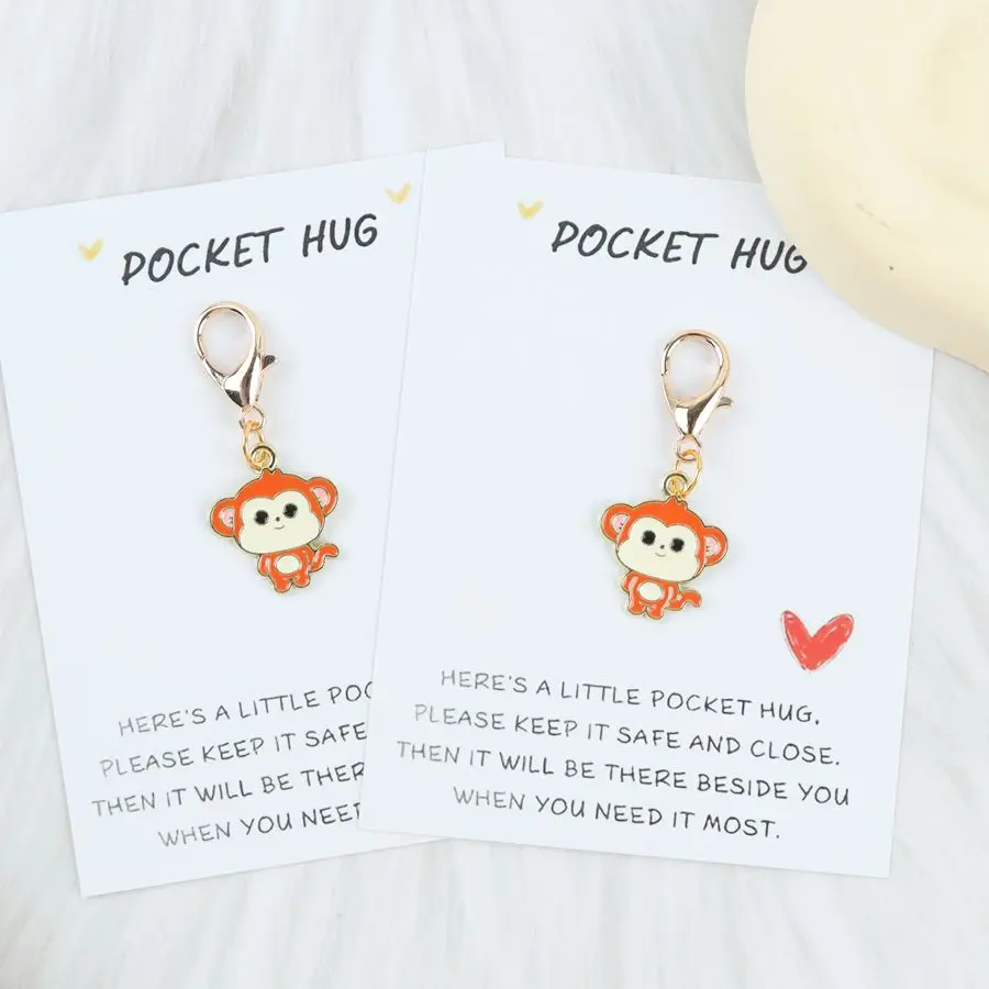 1pc/2pcs Cute Monkey Keychain with a Pocket-Sized Card Featuring a Heartfelt Message, Perfect for Birthdays and Parties.