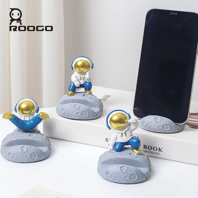 ROOGO New Hip Hop Astronaut Sculpture Small Creative Space Phone Holder for Desk Resin Astronaut Figurines Miniature Home Decor