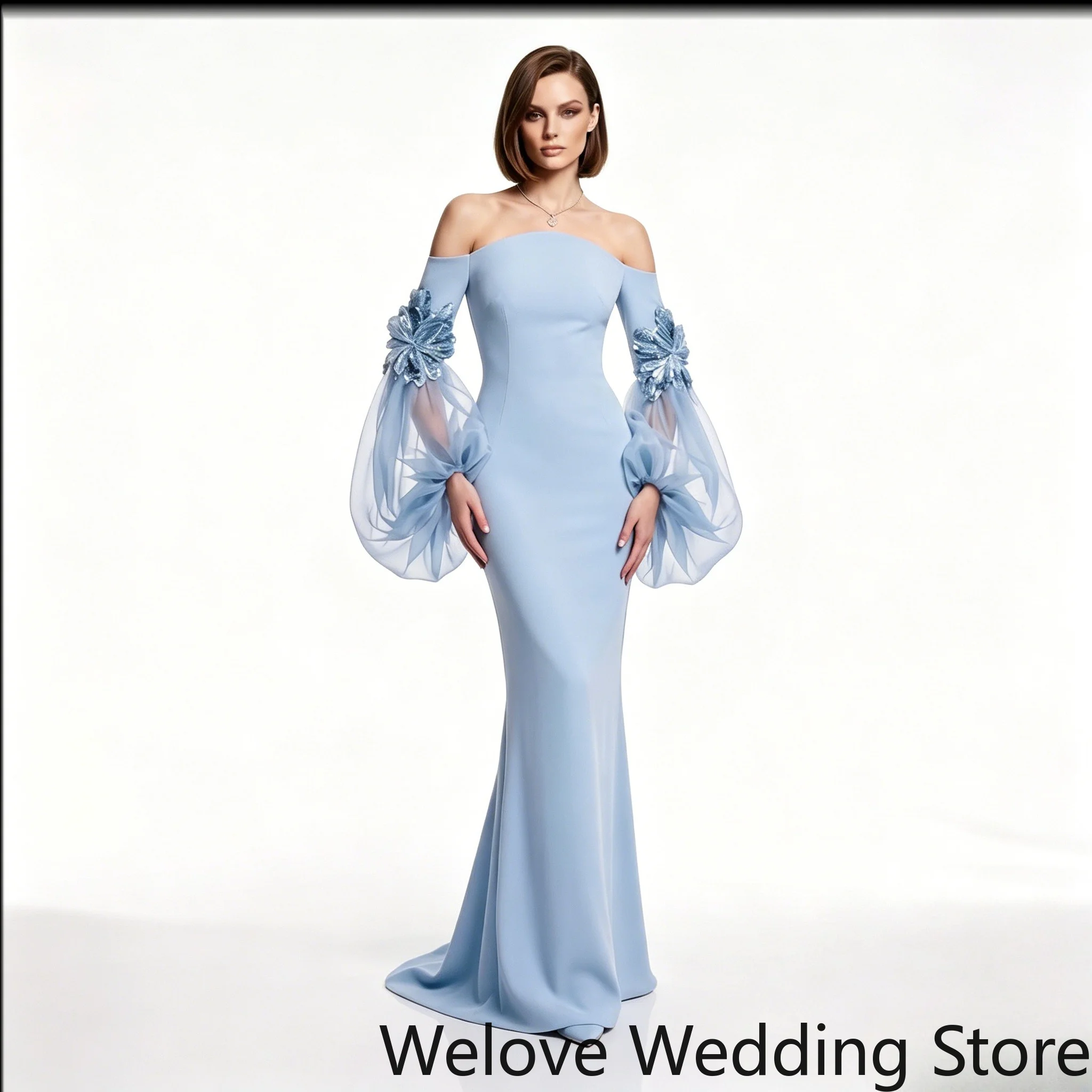 Evening Gown Featuring an Off-the-Shoulder Neckline Form-fitting Mermaid Silhouette Dramatic Puff Tulle Sleeves Floral Appliqué
