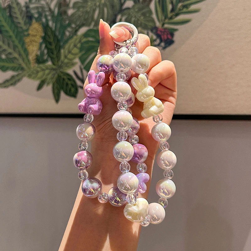 Брелок-бабочка с бантом, украшенный бисером