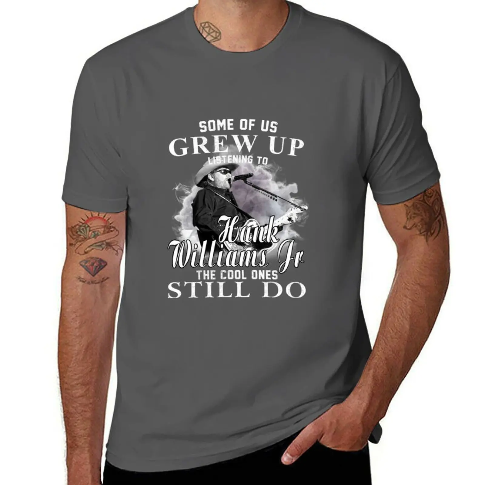 

Hank Williams Jr T-ShirtSome Of Us Grew Up Listening To Hank Williams Jr The Cool Ones Still Do T-Shirt