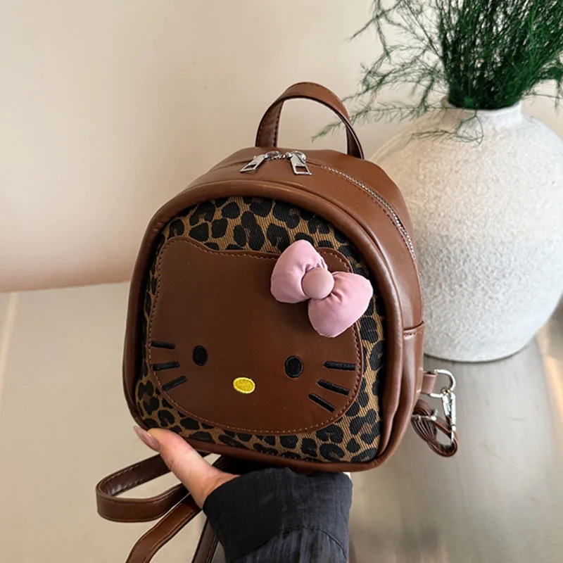 

Hello Kitty Mini Backpack for Girls Winter New Leopard PU Outing Handbags Cute Cartoon Pattern Aesthetic Zipper Kids Schoolbag