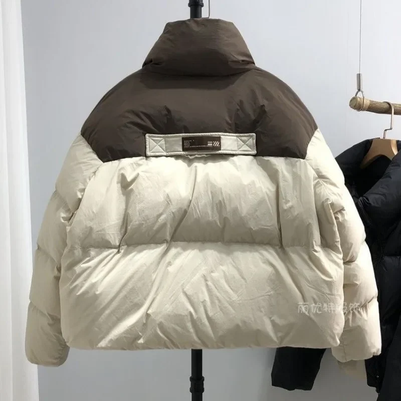 Abrigo de algodón de gama alta, Parkas cortas, Chaqueta de algodón cálida para Mujer, diseño elegante holgado de retales para invierno, prendas de vestir exteriores a prueba de viento para Mujer, nuevo