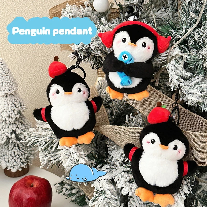 Apple Penguin Plush ของเล่นพวงกุญแจการ์ตูน Penguin ถือปลาตุ๊กตายัดไส้ตุ๊กตาจี้กุญแจรถกระเป๋าเป้สะพายหลังกระเป๋าตกแต่งเด็กของขวัญ