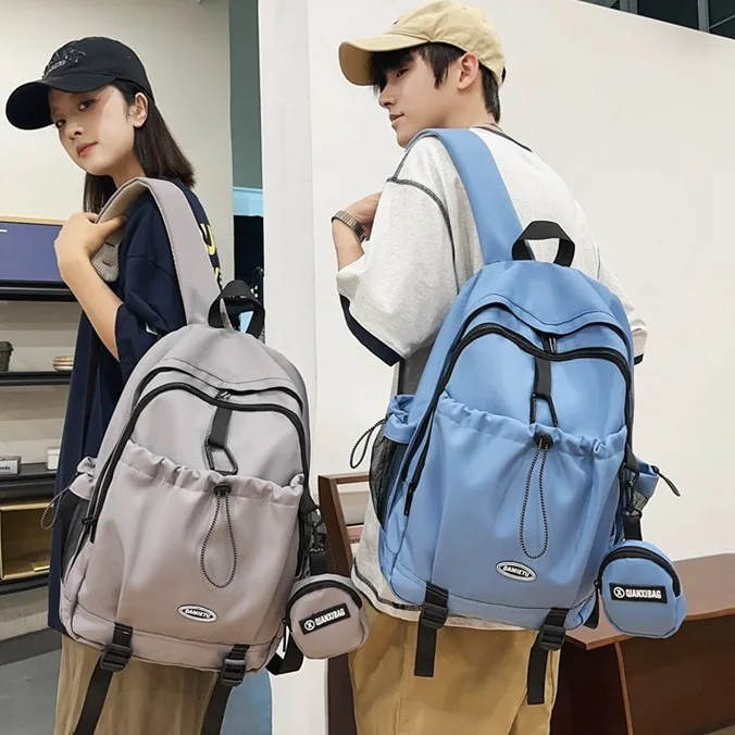 

Nylon lightweight student schoolbag with drawstring zipper, large capacity 14-inch computer storage, waterproof travel backpack