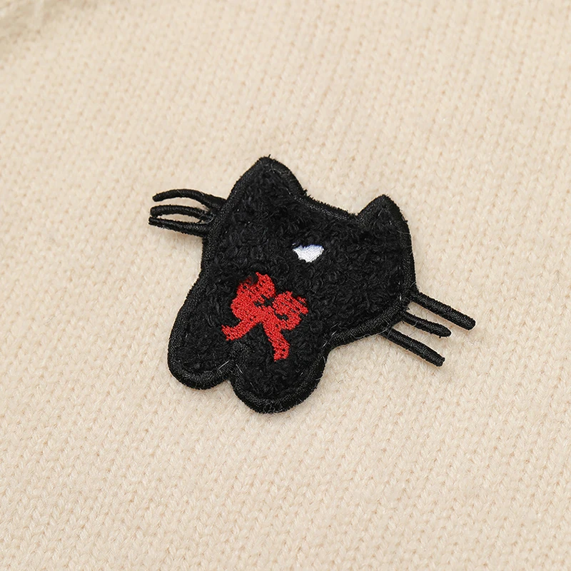 ELFSACK 2025 hiver nouveautés décontracté couleur unie dessin animé petit broderie Cardigan pour femme