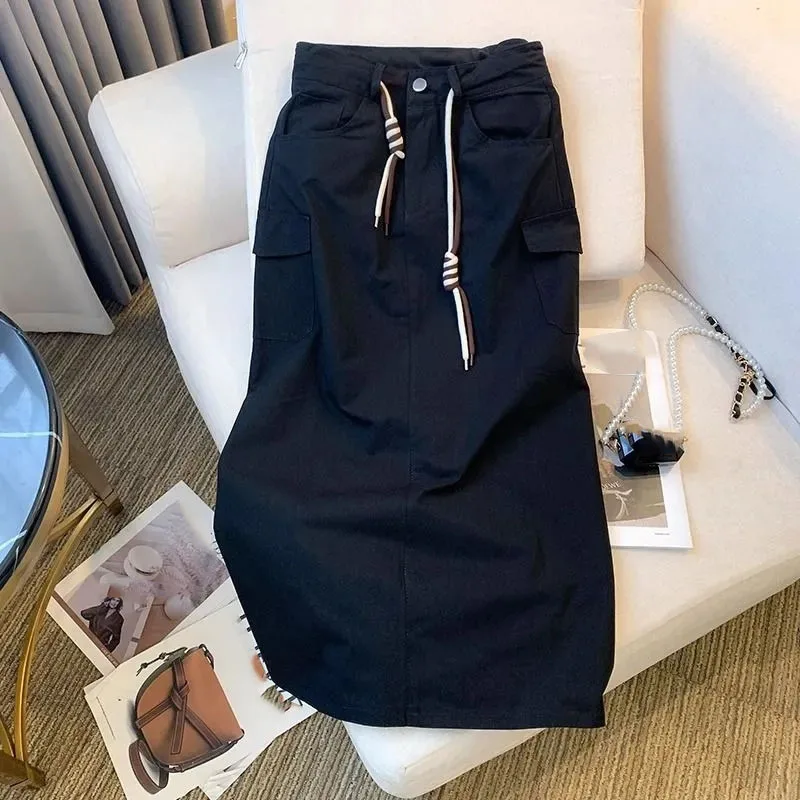 Damska spódnica maxi z wysokim stanem, kieszeniami i rozcięciem, nowość 2026, wiosna-lato, średniej długości, jednolita, duży rozmiar 4XL.