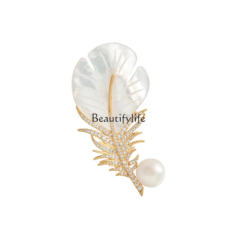 

Natural freshwater mother of pearl feather brooch high-end exquisite and high-end light luxury suit corsage