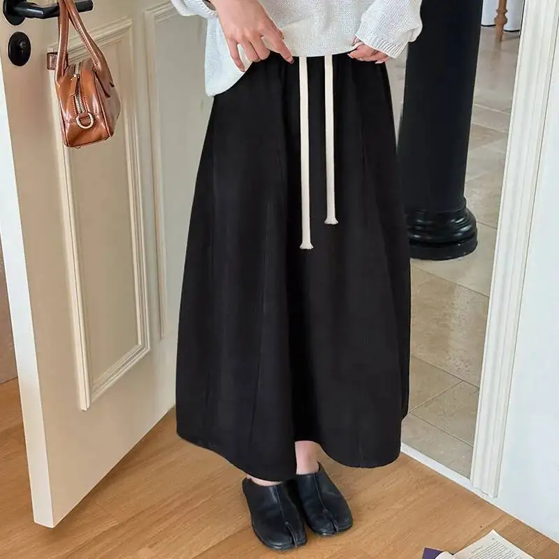 กระโปรงทรงเอ midi ผ้าลูกฟูกสไตล์วินเทจสำหรับผู้หญิง มีกระเป๋า ผูกเชือก ทรงยาว เหมาะสำหรับฤดูใบไม้ร่วงและฤดูหนาว สไตล์เกาหลี หนา