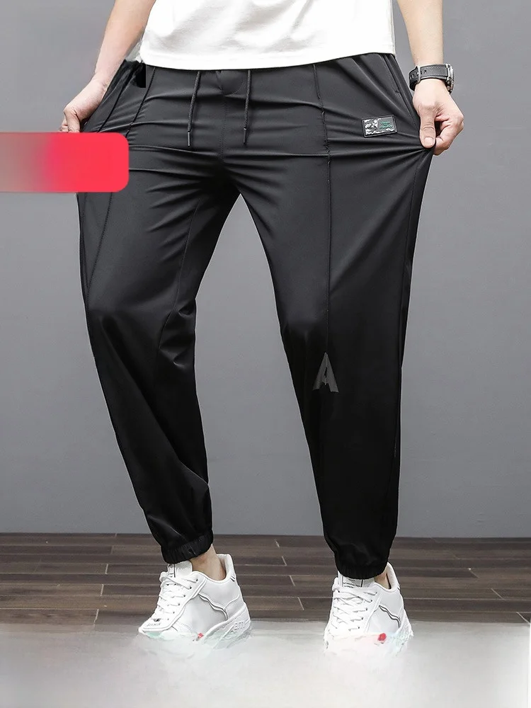 

Мужские повседневные спортивные брюки больших размеров из ледяного шелка, свободные длинные брюки с принтом для отдыха, весна-лето, модные молодежные брюки