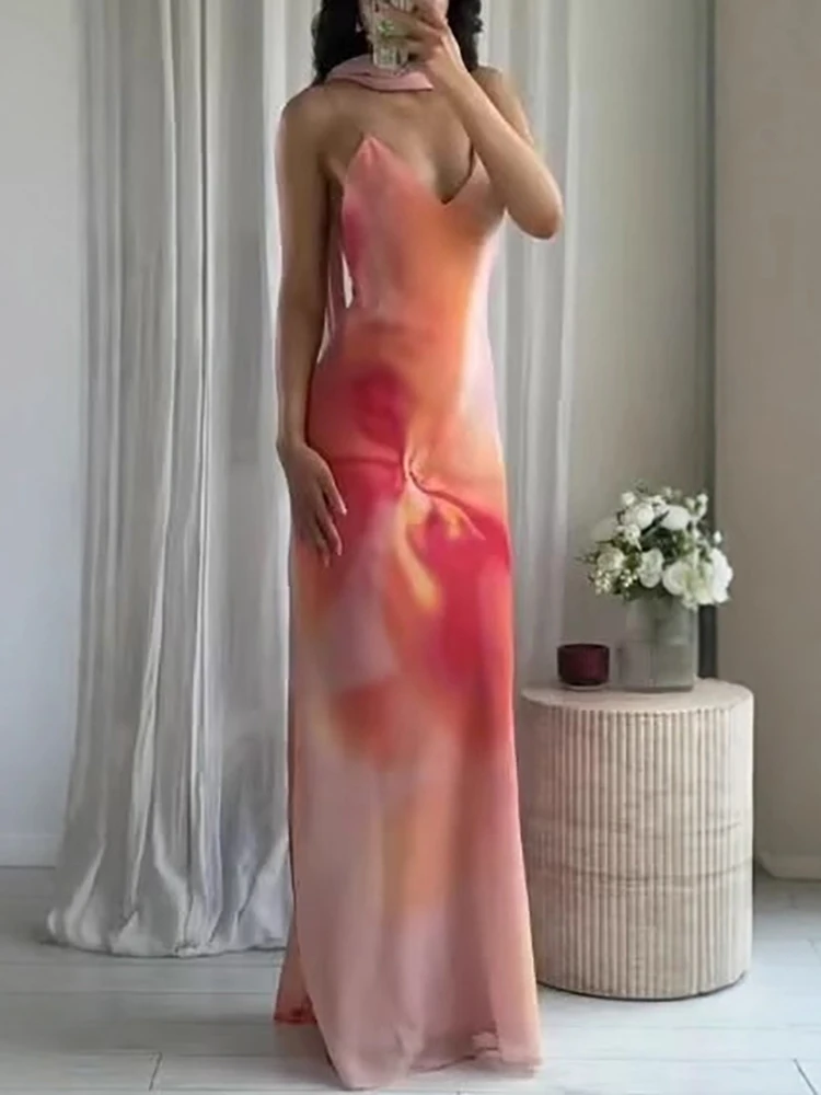 セクシーなVネックノースリーブホローアウトレディースドレスカジュアルボヘミアンビーチロングドレス2026春夏花柄プリントサスペンダードレス