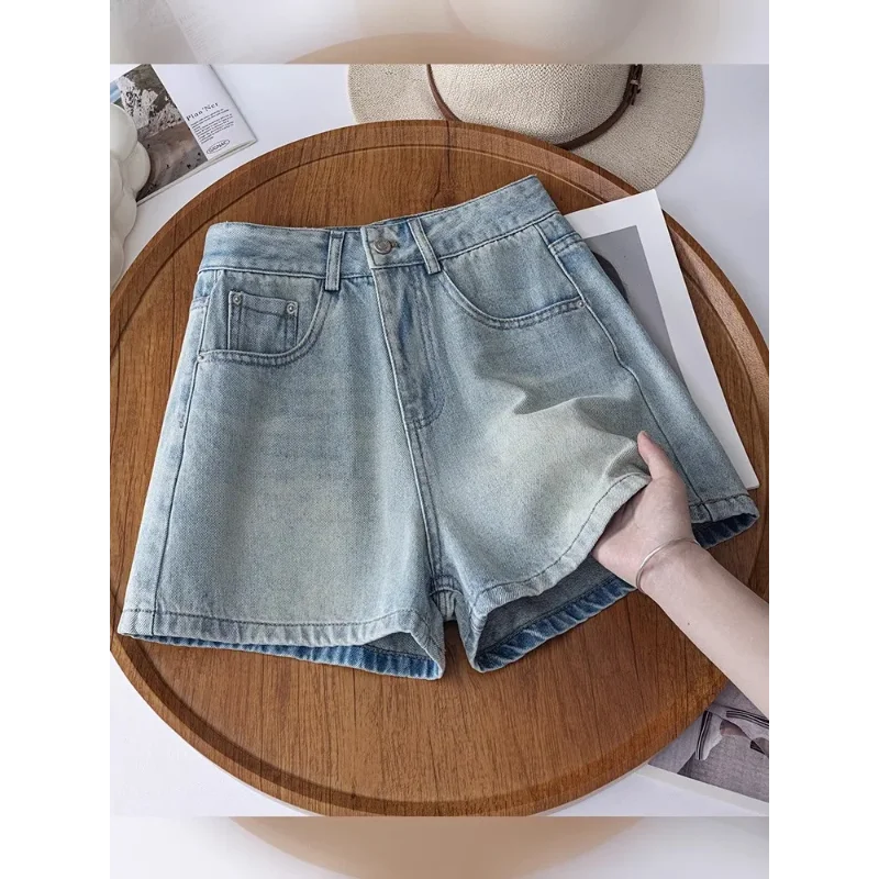 Jasnoniebieskie dżinsowe szorty z wysokim stanem, haftem kwiatowym, codzienne, letnie, damskie, w kształcie litery A, modne.