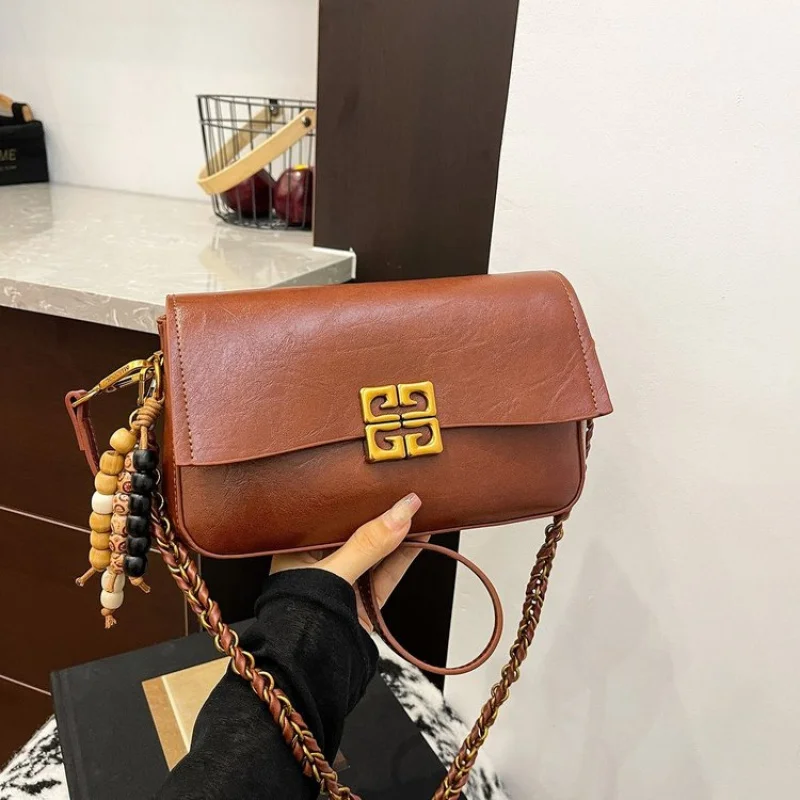 حقيبة يد نسائية جلدية عصرية الراقية العلامة التجارية الفاخرة تصميم عصري خياطة مكررة حقيبة يومية عتيقة ​