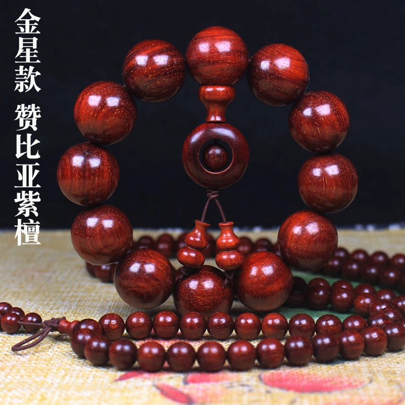 

beads: Zambian golden star small-leaf rosewood blood sandalwood, paired with a dzi vase and Buddhist bead brac