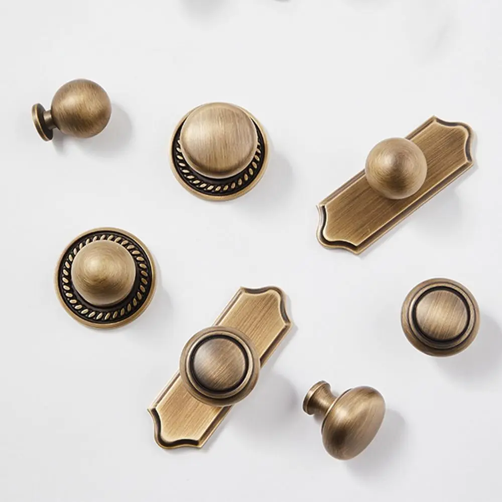 سهلة التركيب الشمال النحاس خزانة سحب الذهب جولة الصلبة النحاس مقبض درج ثقب واحد دائم مقبض باب الخزانة باب خزانة الملابس