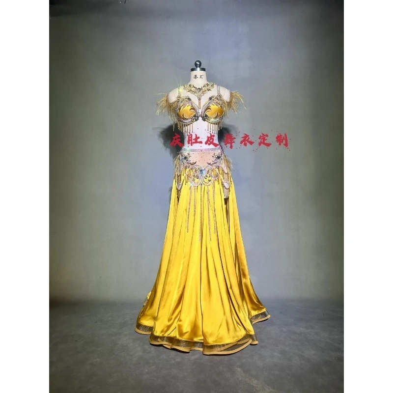 

Индивидуальные костюмы для танца живота, униформа для выступлений, бюстгальтер, оригинальный дизайн, открывающийся танец, титон, золотая юбка с высокой талией, большая распашная юбка