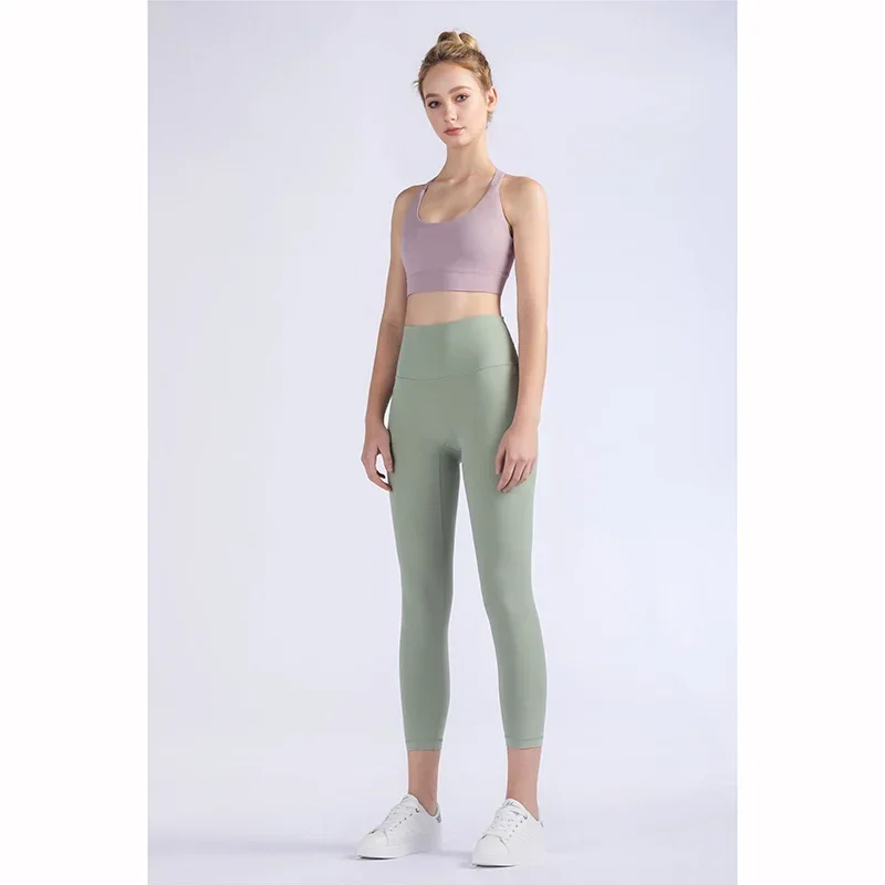 

2023 Hot Sale New Arrival Skin-Friendly Female Yoga Leggings Solid Color High Waist Outside Running Pants Calf-Length