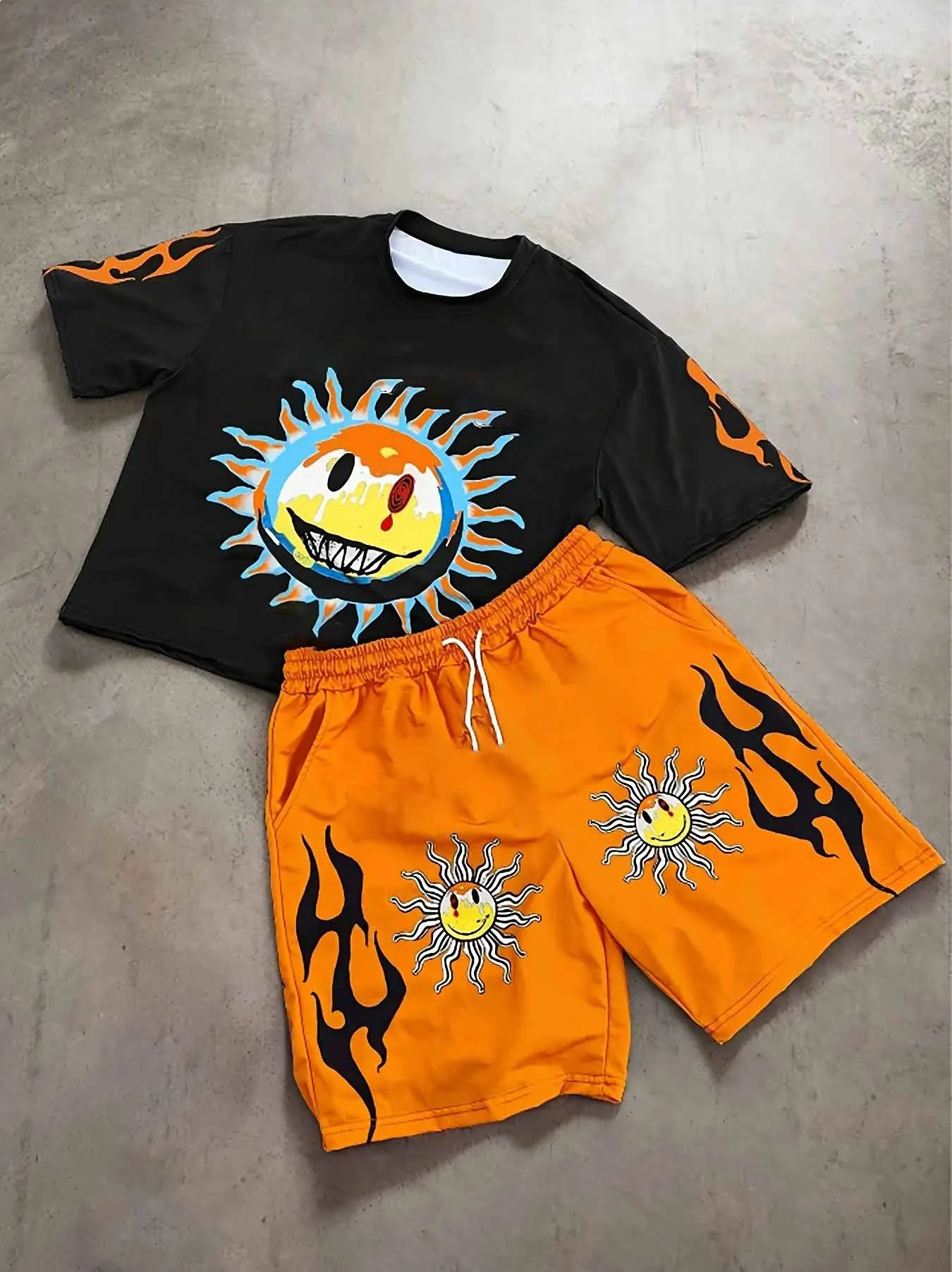 

Dark Flame Sun Print Set: Oversized Streetwear T-Shirt &Orange Flame Shorts | Alternative Two-Piece Streetwea Oversized Graphic