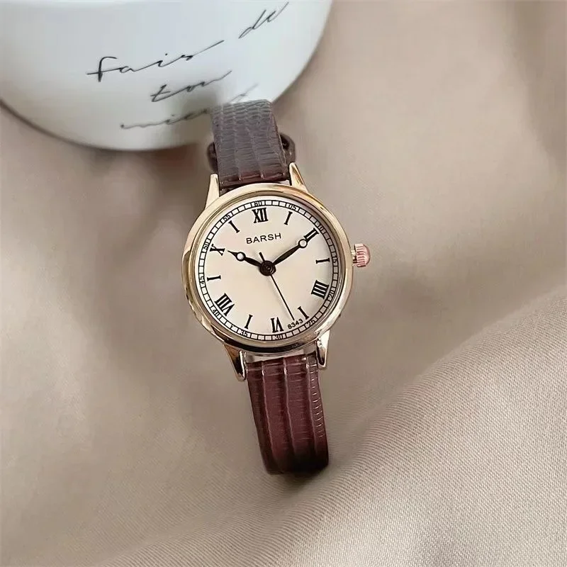 Neue Mode Nische Damenuhren Damen Licht Luxus Student Premium Gürtel Vintage Quarz Armbanduhren Römische Ziffer