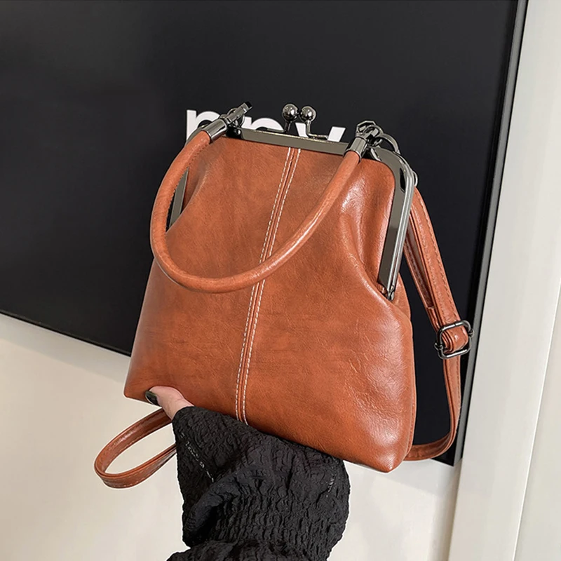 Elegante Clip Lock Umhängetasche Große Kapazität PU Leder Umhängetasche Einfarbig Retro frauen Kleine Handtasche – Detail 22