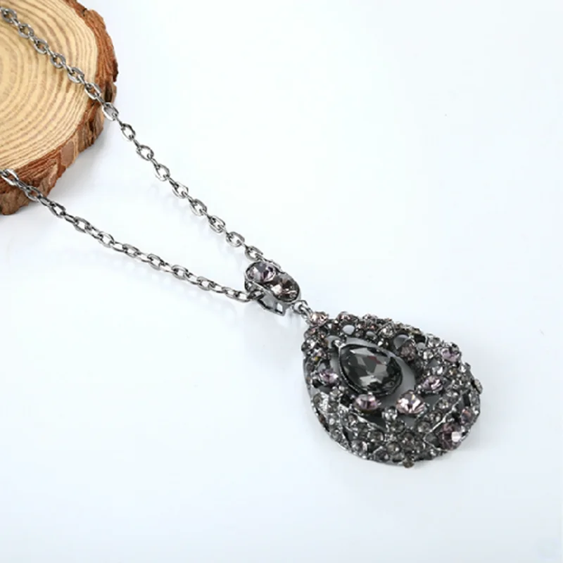 2026 Fashion Women Hollow Printing Triangle Pendant Necklace Long Metal Sweater Chain Alloy Accessories Jewelry For Women Gift
