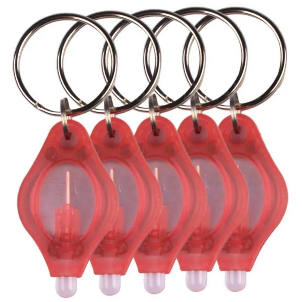 10pcs Mini Keychain Light LED Micro Light Keychain Outdoor Emergency Flashlight ABS Squeeze Light Key Ring For Camping Hiking