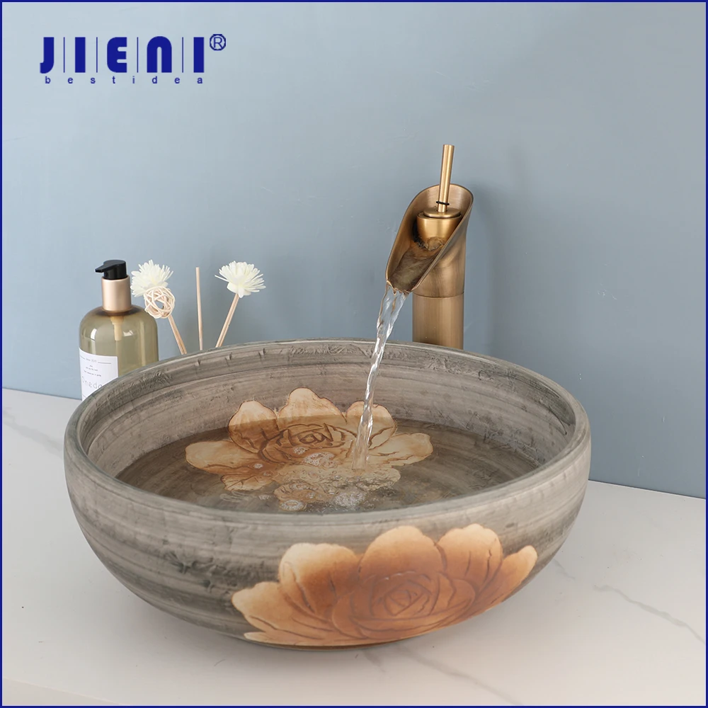 JIENI Brown Art Ceramic Vessel Bathroom Sink Set Peony Painting Ceramic Basin Waterfall Antique Brass Bathroom Faucet Mixer Tap