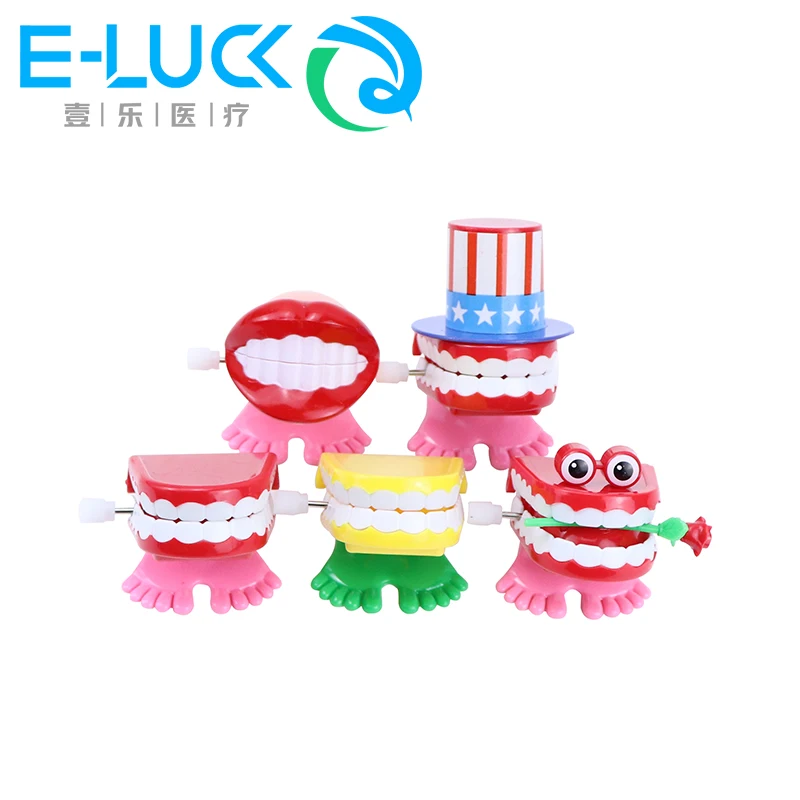 

1Pc Dental Jumping Toy Fun Christmas Halloween Wind Up Toys For Kids Plastic Jumping Teeth Dental Dentist Gifts