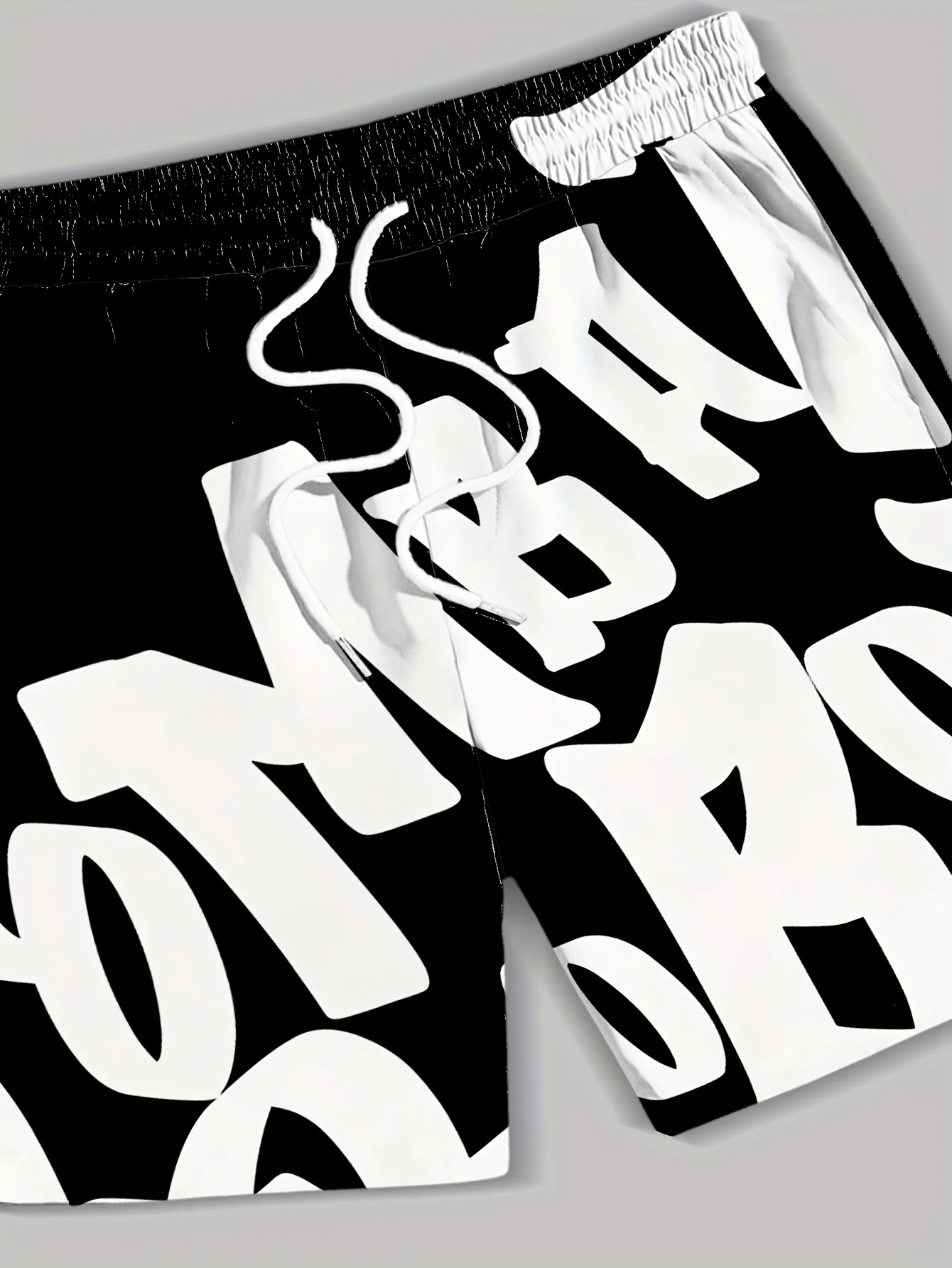 Nowe męskie szorty na lato 2025 są codzienne i modne, z modnymi szortami z nadrukiem 3D