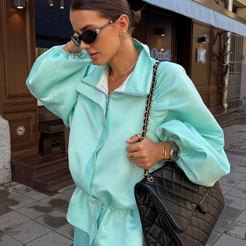Elegante Stehkragenjacke für Damen, einfarbig, locker geschnitten, mit langen Ärmeln, Reißverschluss und Kordelzug, Damenmode 2026, Herbst-Outwear, neu. – Detail 9