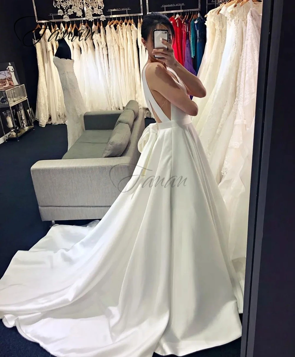 Vestidos de novia elegantes sin mangas personalizados, vestido de novia Sexy con espalda descubierta y cuello en V, vestidos de novia calados de Color sólido