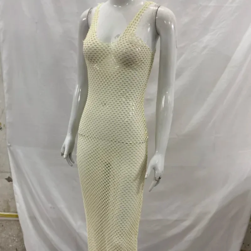 2026 europeu americano doce picante estilo feminino vestido de malha sheer magro oco para fora na moda festa casual outfit