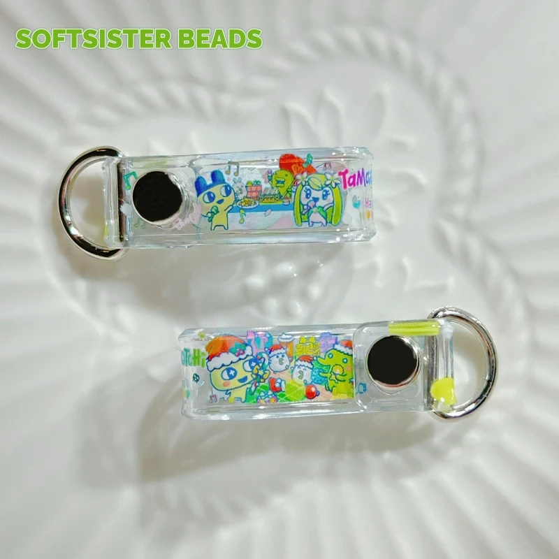 En Stock Tamagotchi alta transparencia grueso lindo Navidad edición limitada doble cara colgante dibujos animados periferia decorativa