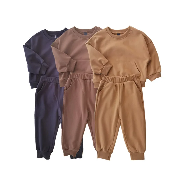 

Шикарный комплект в корейском стиле для мальчиков и девочек весной и осенью, хлопковая толстовка с большими карманами и длинные брюки, детская повседневная одежда.