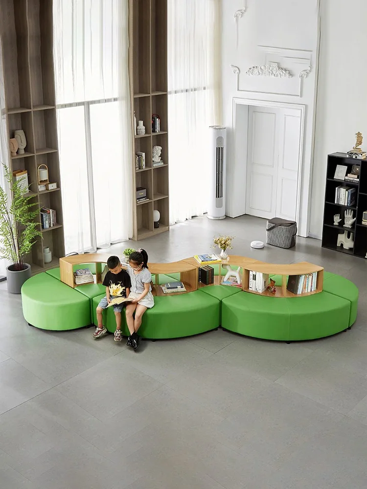 Library reading area, bookshelves, sofas, rest, irregular shapes, school shared leisure hall reception