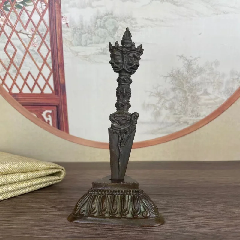 Contaminated Tibetan Tantric Ritual Instruments: , -hurkha, and copper-plated . Large bronze Pumba vajra with bas