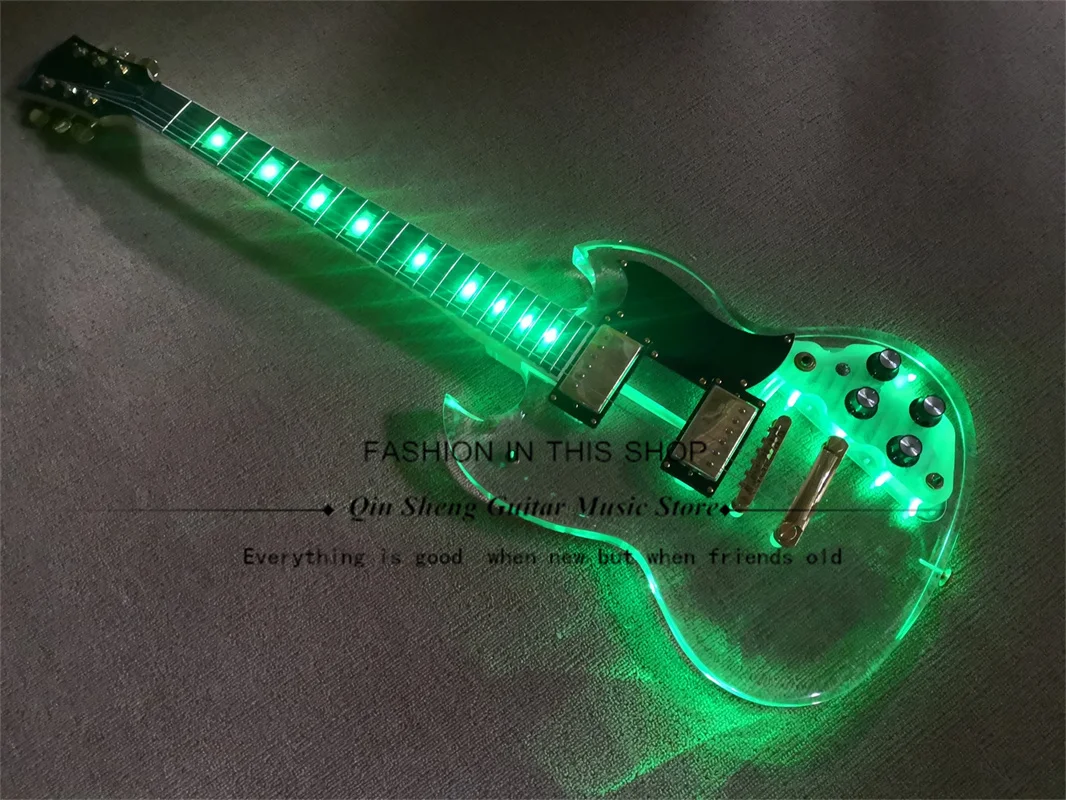 

6-string Electric Guitar, Acrylic Clear Body, Rosewood Fretboard, Green LED lights, Chrome Bridge