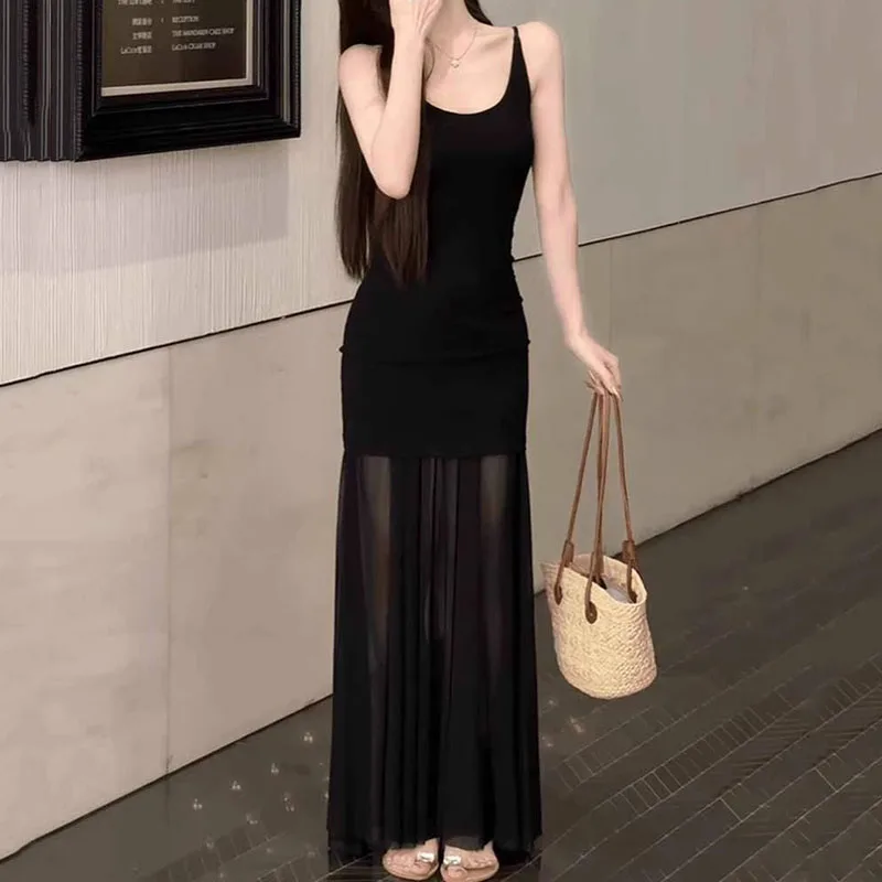 Nouvelle robe longue sexy noire pour femme, à fines bretelles, en maille transparente, coupe ajustée, idéale pour les soirées, collection 2026