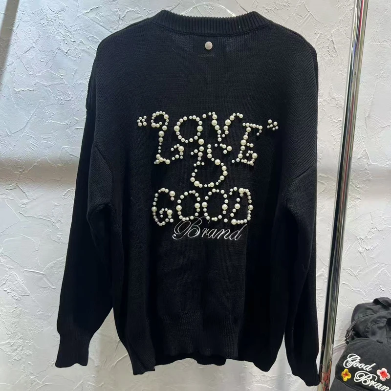 Nuevo estilo coreano buen Top Pearl Knight suéter de punto abotonado de un solo hombro cuello redondo Goodbrand pulóver suelto Casual Stock