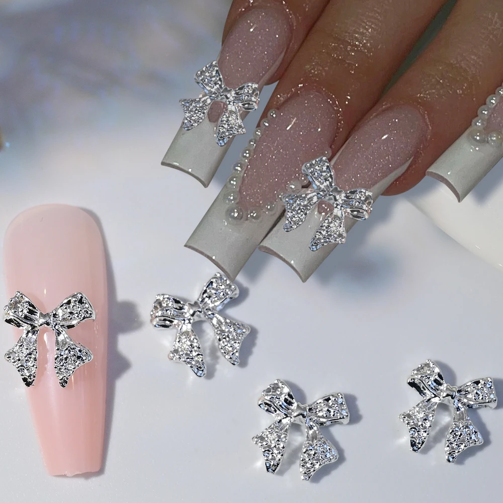 50 pezzi in lega di metallo bowknot gioielli per nail art oro argento papillon ciondoli per unghie super flash farfalla forniture per unghie accessori fai da te *