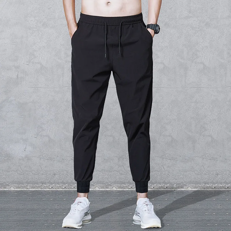 Men\'s Summer Ice Silk Pants Mesh Breathable Casual Thin Quick Dry Pants Loose Elastic Beam Feet Pants Sports Fitness Trousers
