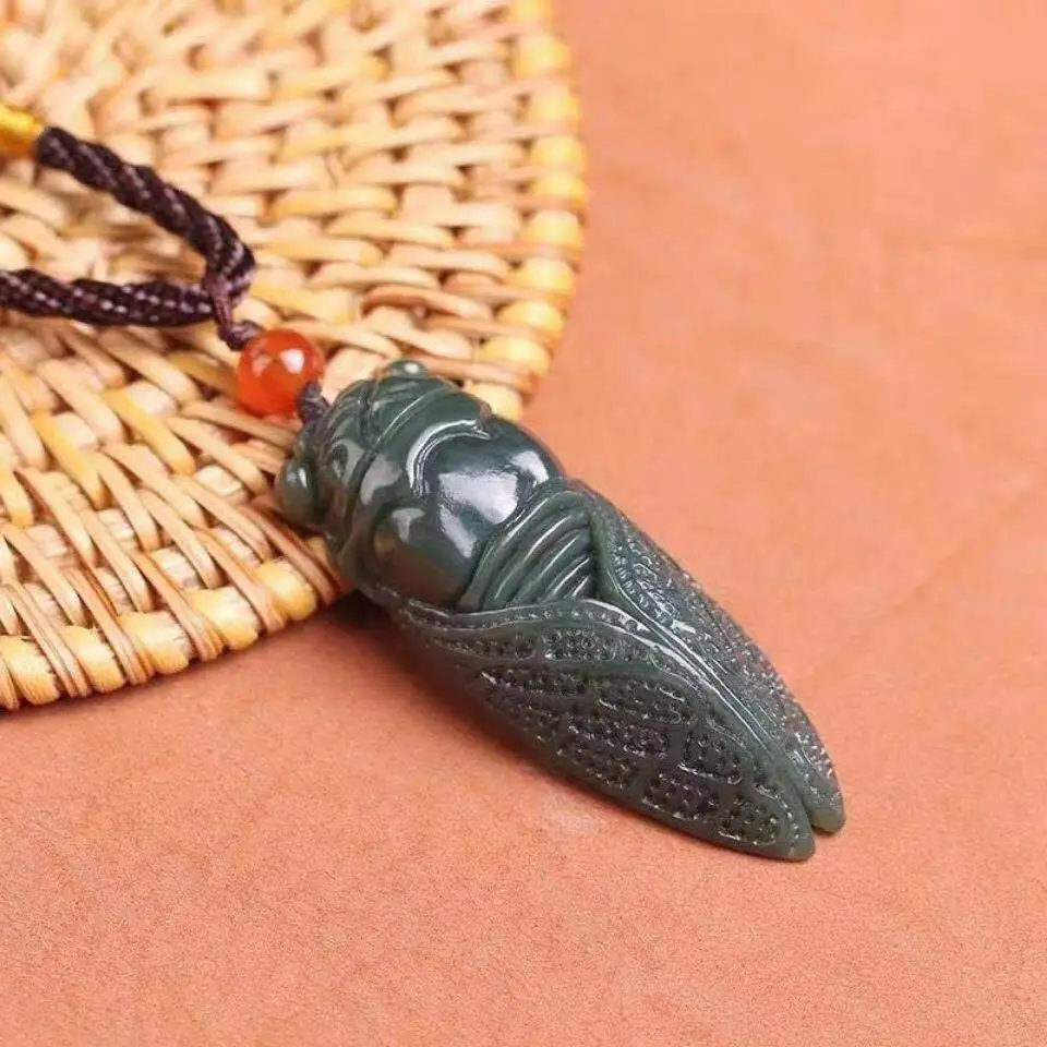 

Hetian jade sapphire ink jade black sapphire Yiming amazing jade cicada pendant